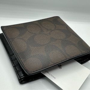 Brand new COACH wallet in Signature Canvas